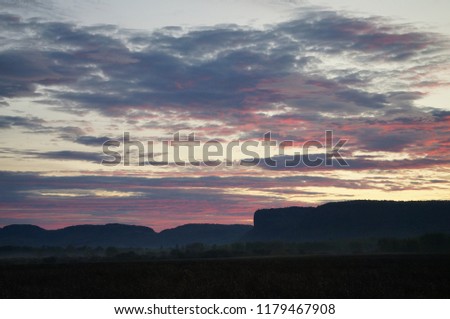Sunset over the mountains and forest 