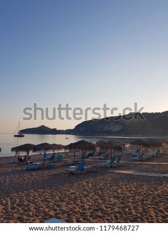 A wonderful sunset picture of Agios Georgios Bay on the Greek island of Corfu.