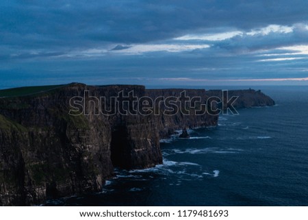 The cliffs of moher during blue hour. The photo is moody.