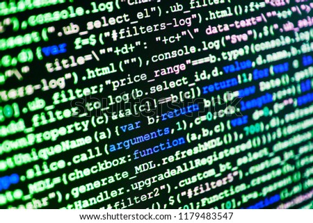Writing programming code on laptop. CSS, JavaScript and HTML usa