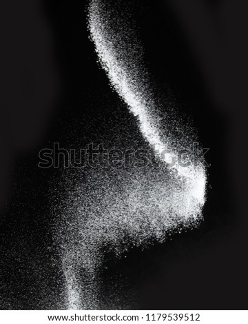 fluffy powdered sugar on black background Royalty-Free Stock Photo #1179539512