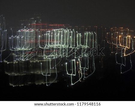 light painting, Abstract background of Long exposure light trails, night photography, noisy and blurred