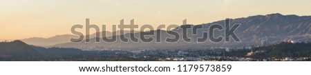 Sunset landscape view of silhouette yellow mountains in Los Angeles California
