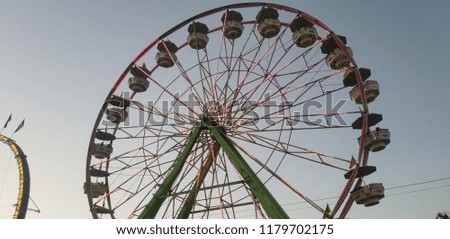Picture of a Ferris Wheel taken at a local town fair.
