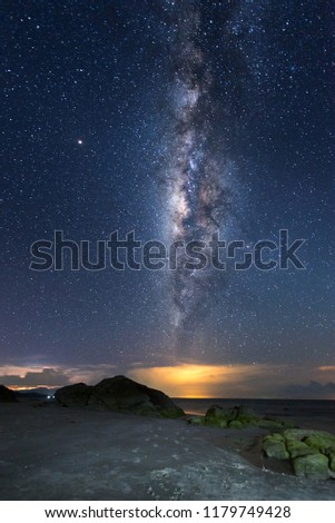 Bright Milky Way Galaxy rise above Kudat, Malaysia sky. soft focus and noise due to long expose and high ISO.