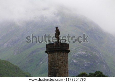 The Glenfinnan Monument. Charles Edward Stuart aka Bonnie Prince Charlie, stands on  top of the column , leader of the Jacobite uprising between 1745-46. Glenfinnan, Highlands Of Scotland, UK