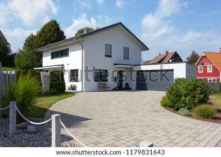 modern building facades and details of village in south german bavaria countryside Royalty-Free Stock Photo #1179831643