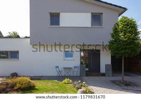 modern building facades and details of village in south german bavaria countryside Royalty-Free Stock Photo #1179831670