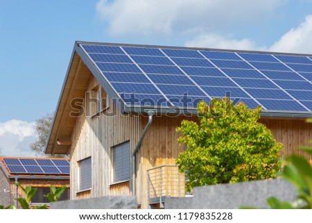 solar panel of modern building facades and details of village in south german bavaria countryside Royalty-Free Stock Photo #1179835228