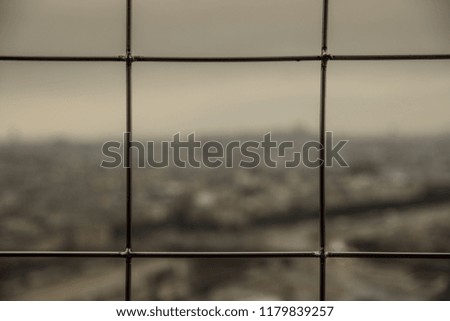 Close-up of a steel wire mesh fence in Eiffel Tower, Paris