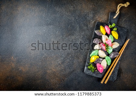 Traditional Chuseok day food, Korean Half-moon Shaped Rice Cake Songpyeon, white marble background copy space top view