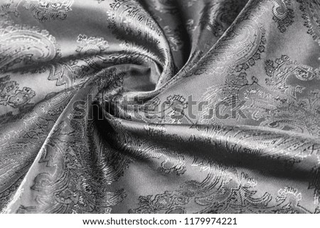texture, background, black steel gray fabric with a paisley pattern. based on traditional Asian elements