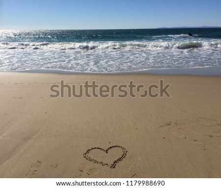 Walking on the beach, I drew a heart onto the sand and took a picture. It shows my love for the sea.