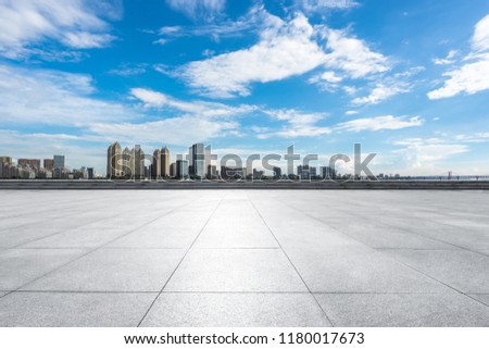 empty square with city skyline in wuhan china