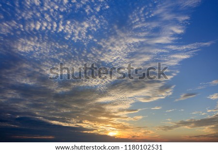 Abstract seascape sky background - Sunset colors with beautiful hues of blue, orange, and yellow. Peaceful meditation image. Minimalistic simple background image, Sign from Heaven, Cloud Patterns