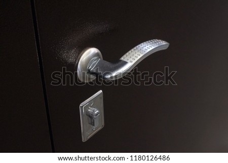Metal entrance door part: door handle