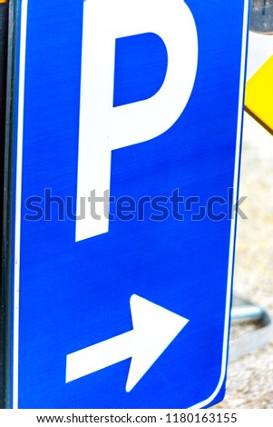 closeup of parking area sign