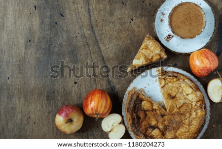 Fresh baked delicious classic American apple pie. Top view, rustic style, copy spaceautumn consept                        Royalty-Free Stock Photo #1180204273