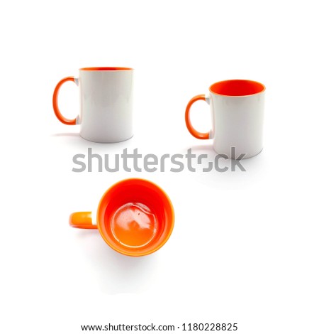 White coffee cup, Orange surface isolated on white background.