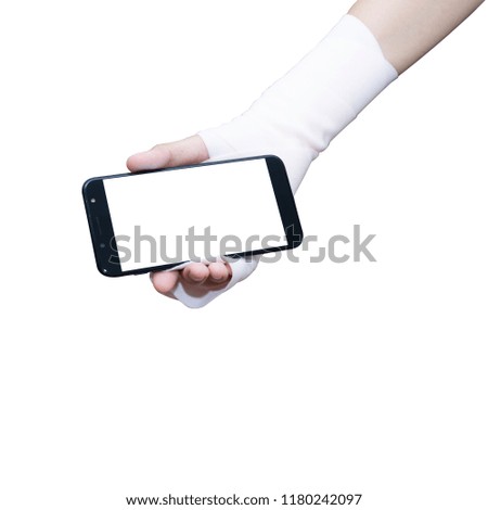 Cotton crepe bandage on hand holding smart phone  of female Asia girl on white back ground isolate, touch on screen by finger and hold by hand with clipping path.