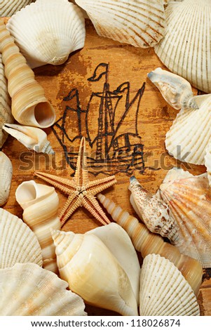 The ancient sailing ship on a birch bark, shells and starfish