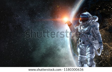 Spaceman and his mission. Mixed media Royalty-Free Stock Photo #1180300636
