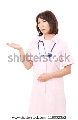 Portrait of asian female nurse rise hand showing blank sign