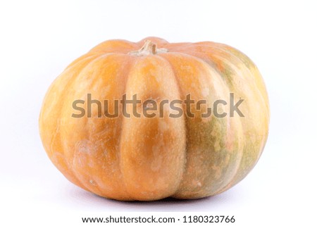 Pumpkin on white background. Isolated pumpkin. Orange vegetable close-up. Healthy food. Preparation for Halloween