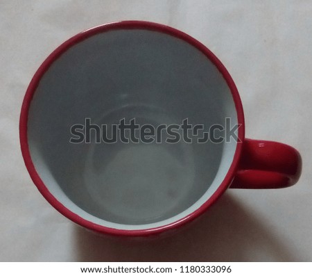 Soup cup mug,a red ceramic cup isolated on white background Royalty-Free Stock Photo #1180333096