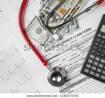 Health insurance application form with banknote and stethoscope concept for life planning

