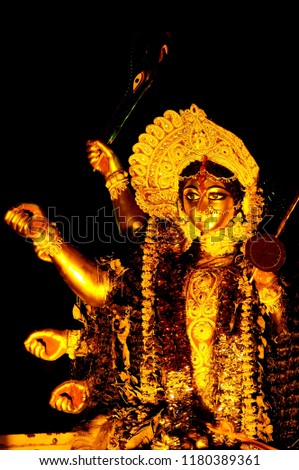 Image of closeup of Goddess Durga taken at a street side temple