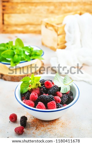 blackberry and raspberry in bowl, stock photo