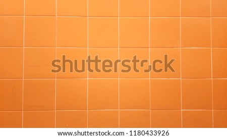 orange tile floor clean condition with grid line for background Royalty-Free Stock Photo #1180433926