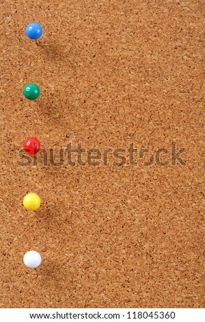 Cork board with pins bullets