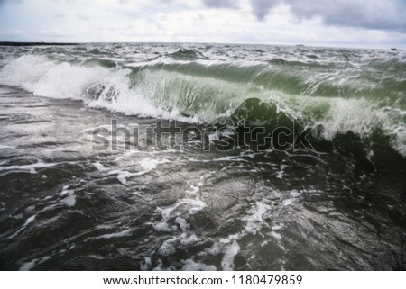 Storm waves on the seashore as a background