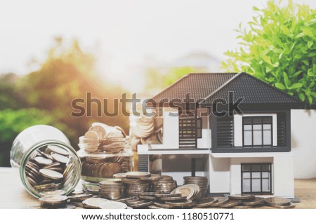Model house with your deposit money.Real estate and mortgage investment concept.