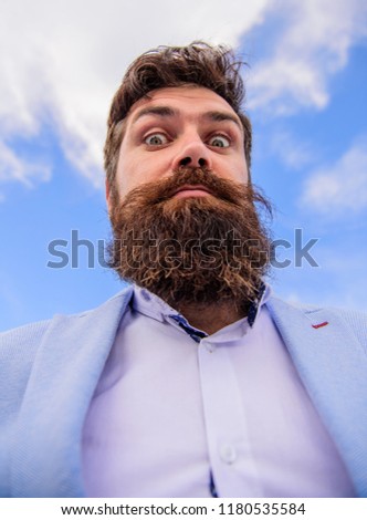 Expert tips for growing moustache. Man bearded hipster with mustache sky background. Ultimate moustache grooming guide. Hipster handsome bearded attractive guy bottom view. Check out my long beard.