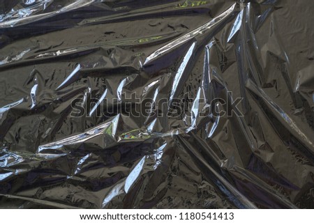 Black polyethylene construction film.