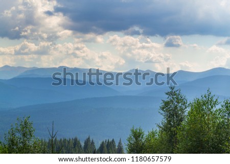 Mountain landscape. Rainy clouds over the mountains.