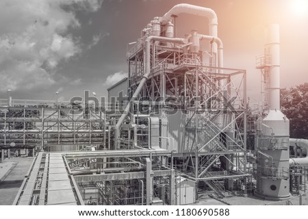 Pipeline and pipe rack of industrial plant with monotone effect, Manufacturing of polymer industrial plant with monotone, Plastic resin plant Royalty-Free Stock Photo #1180690588