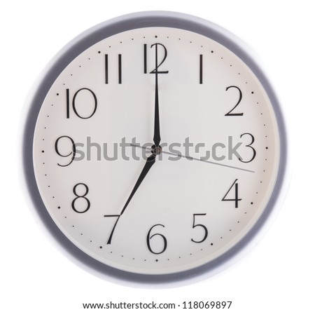 isolated white clock at seven
