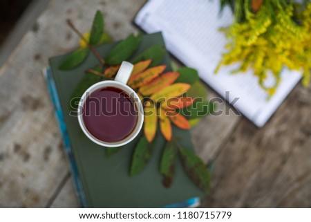 Cup of tea, book, flowers, autumn