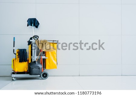 cleaning supplies with modern background and copy space for advertisement text. Royalty-Free Stock Photo #1180773196