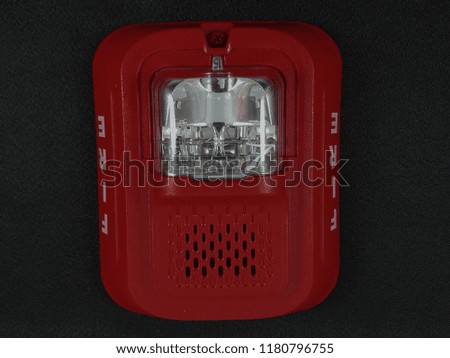 A sound and strobe fire alarm is mounted to the fire alarm system.