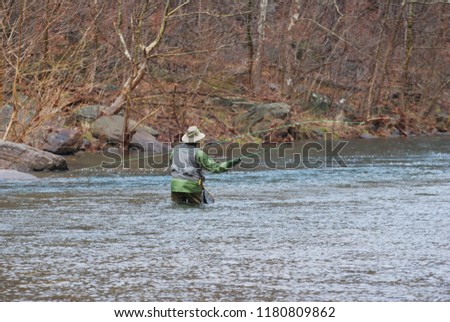 Fly Fishing in River during winter