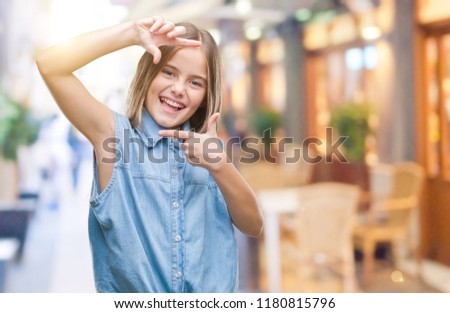 Young beautiful girl over isolated background smiling making frame with hands and fingers with happy face. Creativity and photography concept.