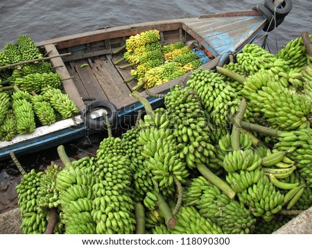 Bananas delivery by boat to the banana market in Manaus, Amazon - Brazil