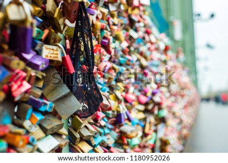 Bridge View Cologne where people express their love padlocks hanging on the fences of protection. Women's panties hang on locks