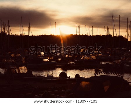 Dramatic sky and beautiful sunset, yacht harbour over the sea in Finland, Europe, Natural background and wallpaper