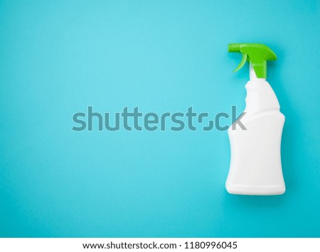 Detergents and cleaning accessories in pastel color. Cleaning service, small business idea, spring cleaning concept. Flat lay, Top view.